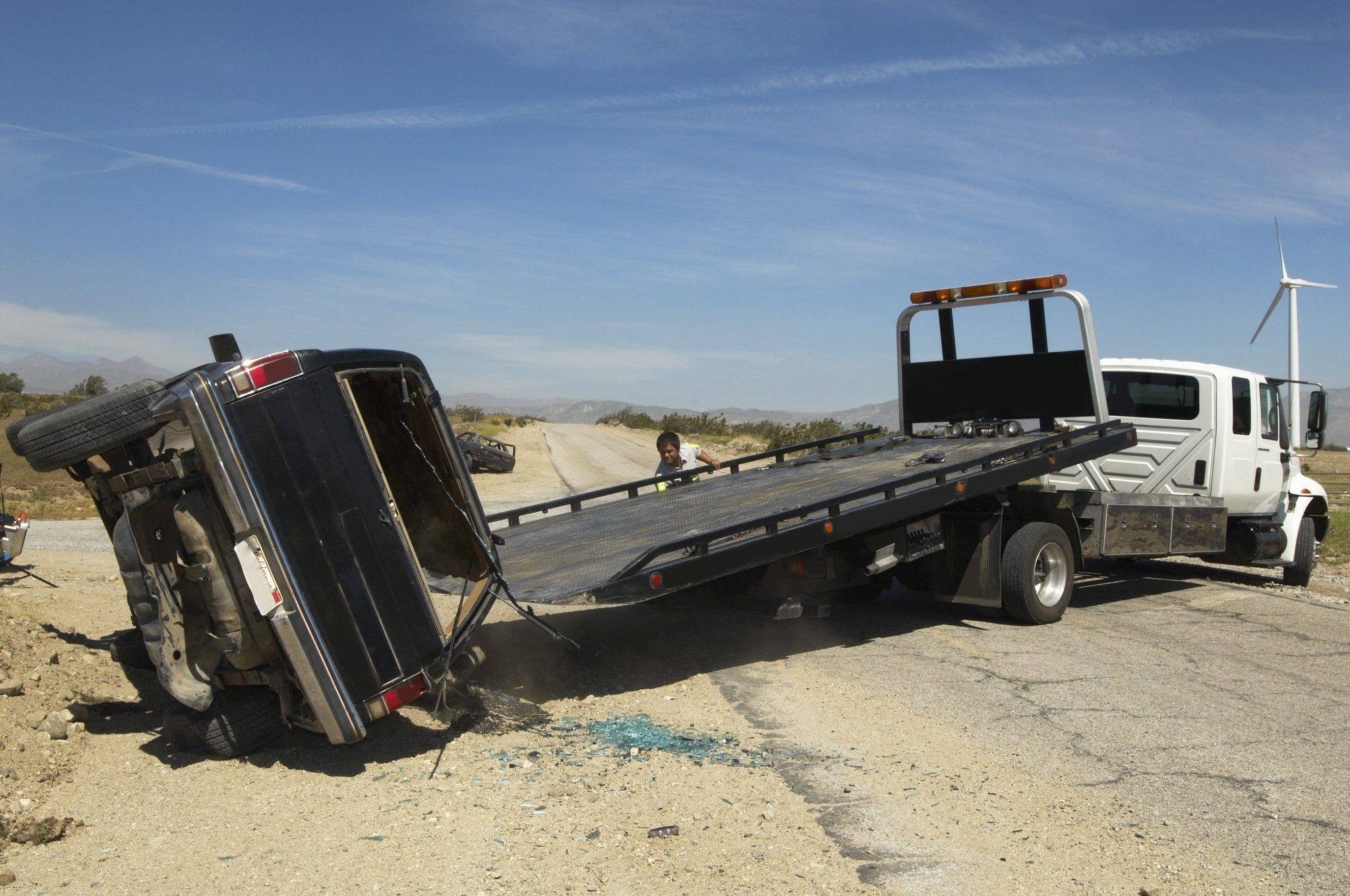 Man Preparing Tow Truck